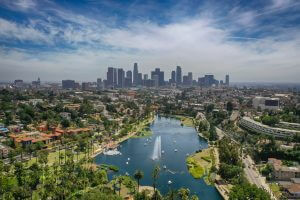 Aerial view of a well-maintained HOA community with residential homes, parks, and green spaces, offering a high-quality living environment for families.