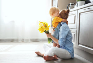 Happy homeowner and child benefiting from exceptional HOA management services in a thriving community